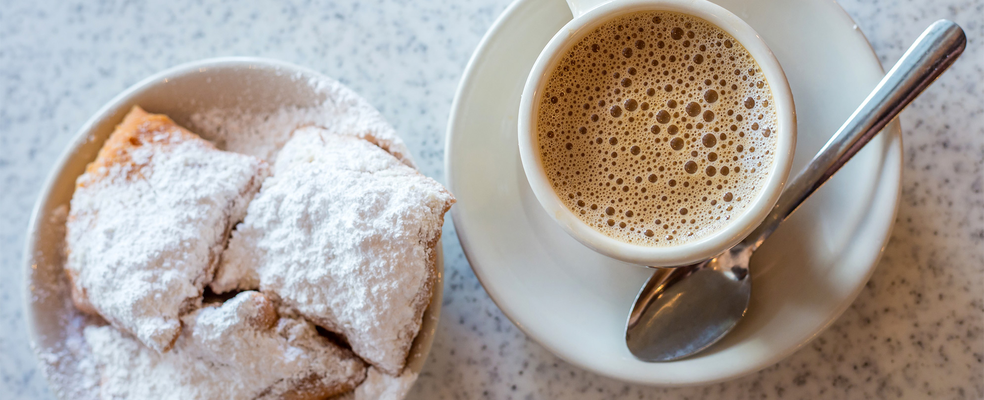 Coffee and beignets at Cafe Du Monde in New Orleans. 